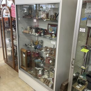 Laminated particle board display case